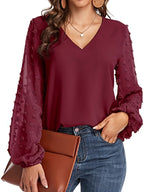 Lena | Blusa llamativa con cuello en V y manga texturizada