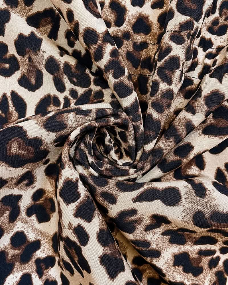Hailey | Abrigo reversible con capucha de leopardo